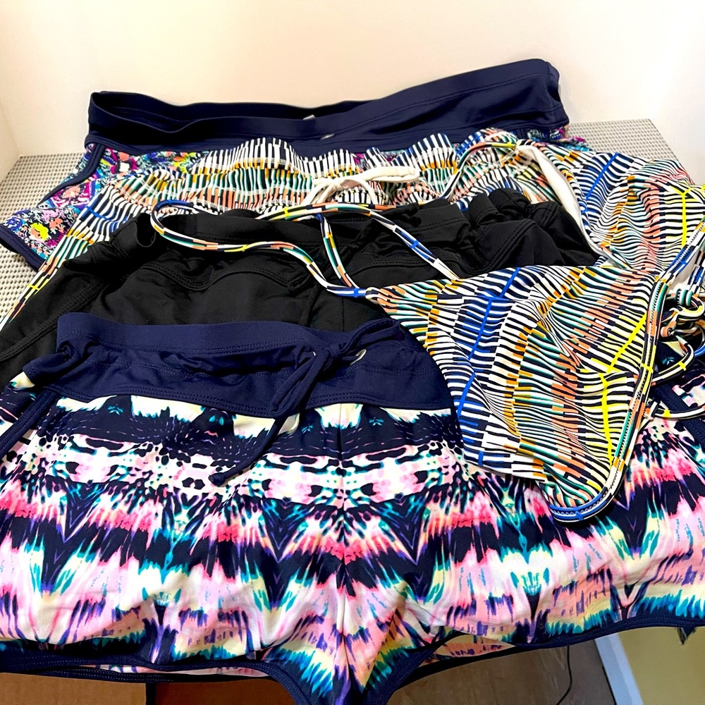Price is for the lot of size LargeXL Athleta swim shorts with bonus Bikini top